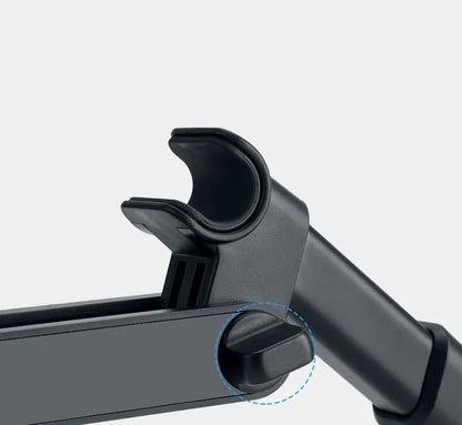 Black car phone holder mounted on vehicle rear seat with tablet secured in snap-in bracket