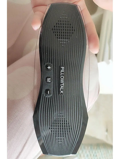 Black wireless in-ear headphones with USB charging case showing Bluetooth connectivity