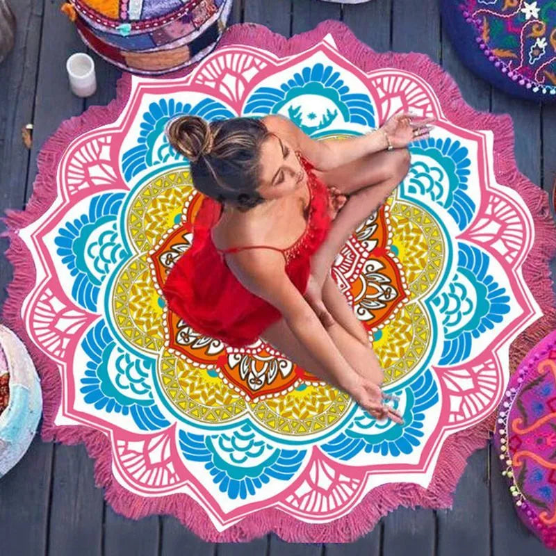Round floor mat with polygon print and tassel trim, shown in available colours.
