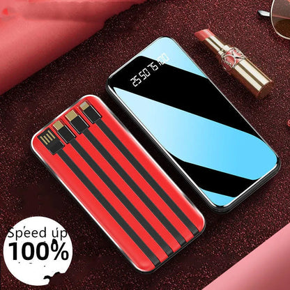 Portable power bank with digital display showing battery percentage and multiple charging ports