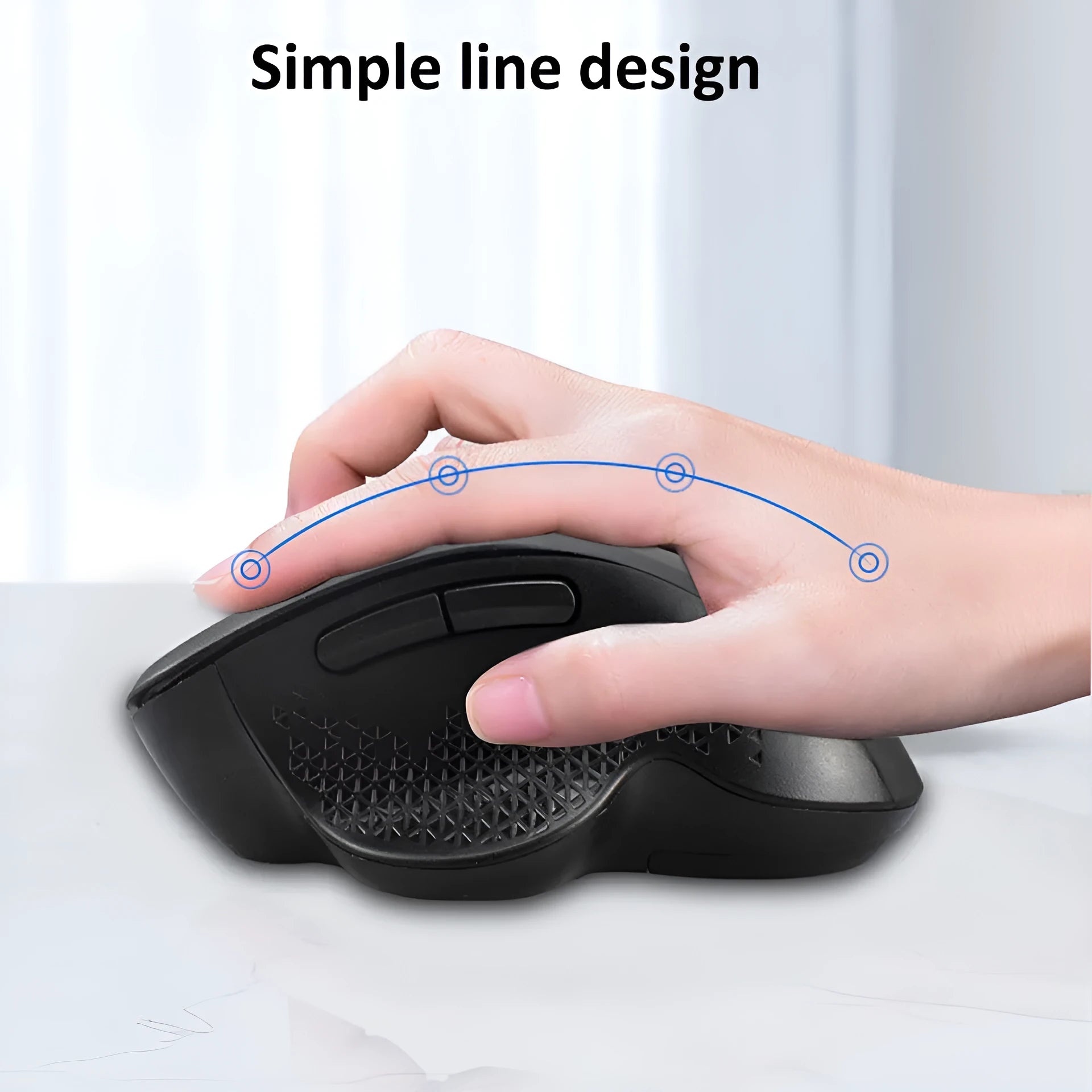 Grey and black wireless laptop mouse with USB-C charging cable on a wooden desk