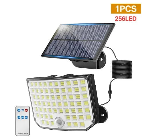 Multi-angle solar-powered garden lamp with motion sensor mounted outdoors