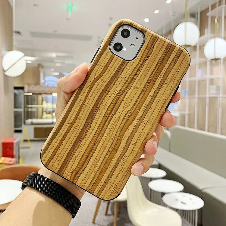 Slim natural wood iPhone case in teak, walnut, black rose, and rosewood colours.