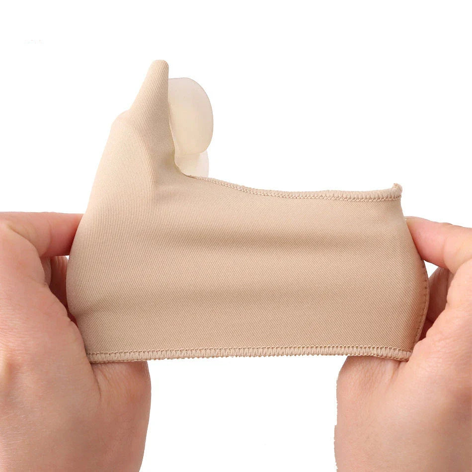 Corrective toe separator socks featuring a gel pad for bunion pain relief and a silicone toe spacer for proper foot alignment
