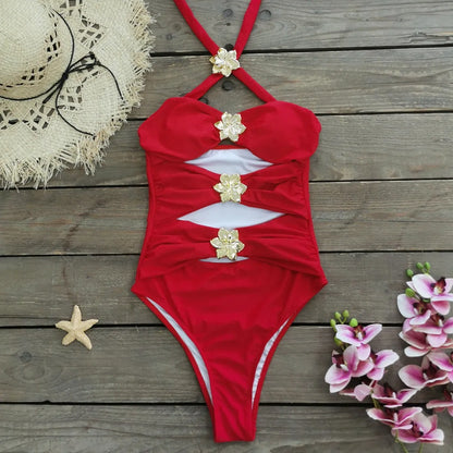 Solid colour women's one-piece swimsuit with attached short skirt and strapless hollow-out tube top design.