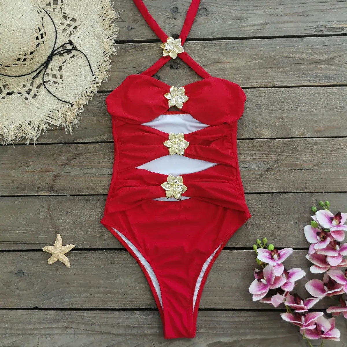 Women's solid colour one-piece swimsuit with detachable short skirt in a high-waisted, hollow-out tube top design.