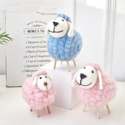 Plush sheep figurines in various colors and sizes, perfect for home decoration and gifting