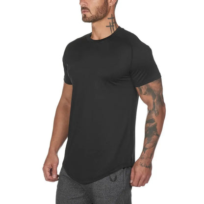 Men's plain grey gym shirt, blouse style, on a hanger showing relaxed fit and cotton-spandex fabric.