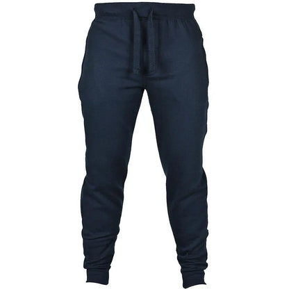 Men's solid colour cotton fleece casual trousers with a drawstring waistband in a loose fit.