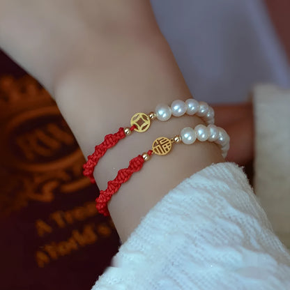 Women's pearl bracelet with braided red rope and geometric fu character charm