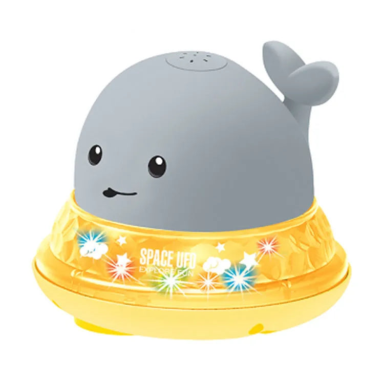 Grey or white electric whale bath toy spraying water with LED lights on a base.