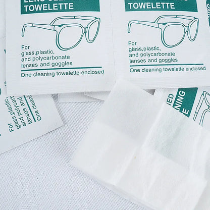 Pack of 100 white, individually sealed quick-drying lens cleaning wipes for glasses and screens.