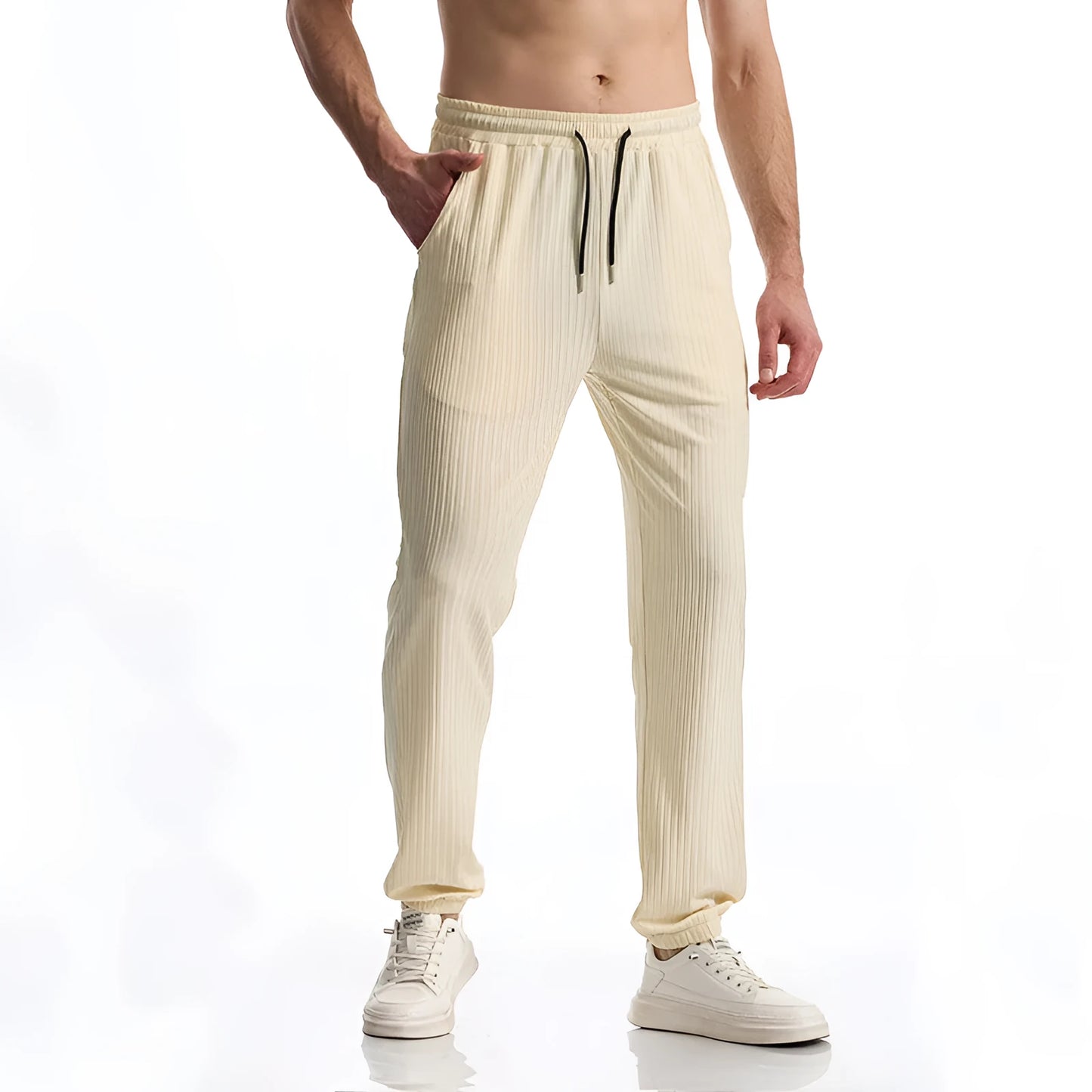 Silky rib fabric baggy straight-leg casual trousers with an elastic drawstring waist in khaki colour.