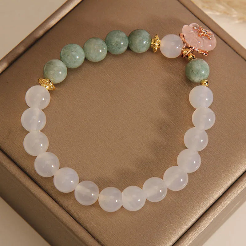 Women's floral jade agate crystal bracelet with white agate stones and pink accents
