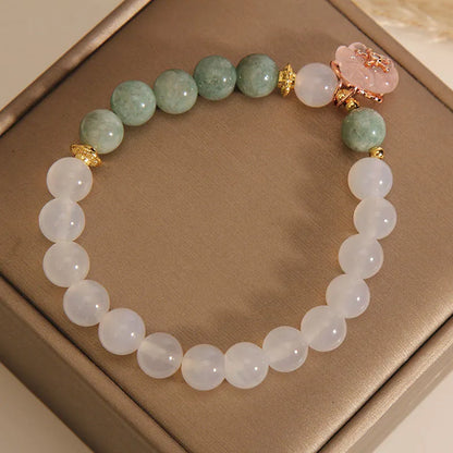 Women's floral jade agate crystal bracelet with white agate stones and pink accents