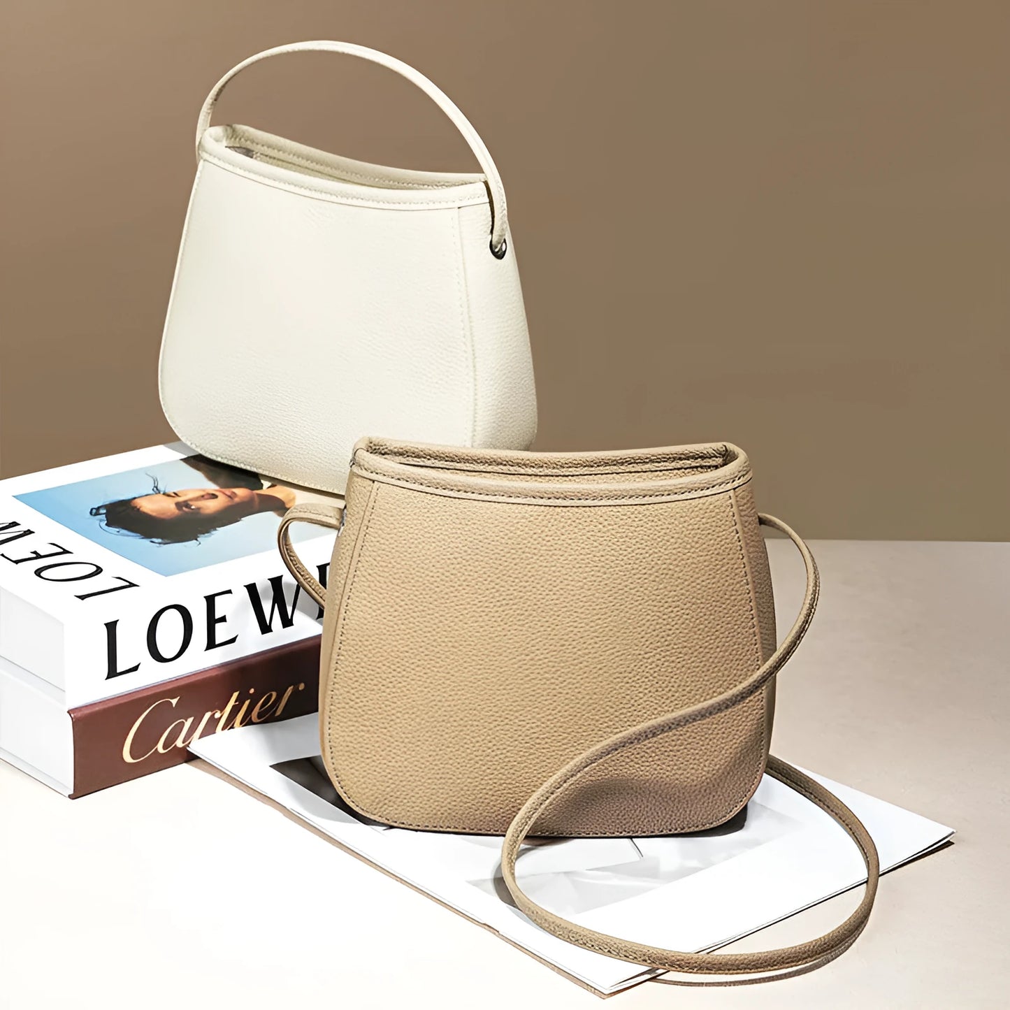 Women's genuine cowhide leather messenger bag showing organisational compartments and sandwich pockets in neutral colour