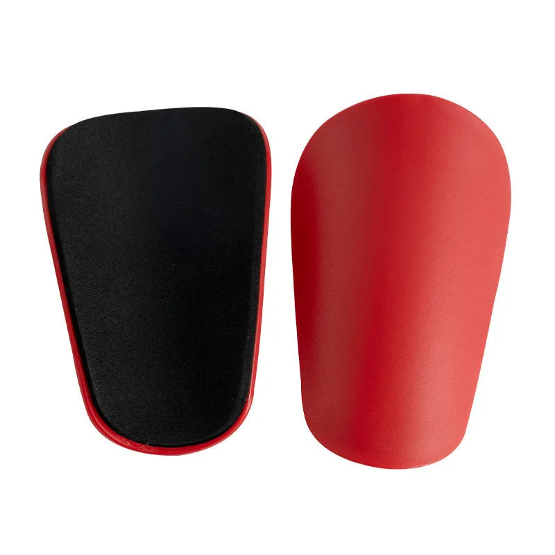 PU mini shin guards for football and running in black, white, red, and blue colours
