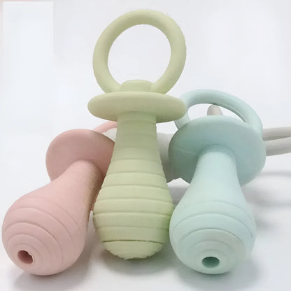 Blue TPR pet pacifier chew toy with squeaker for puppies and kittens on a white background.
