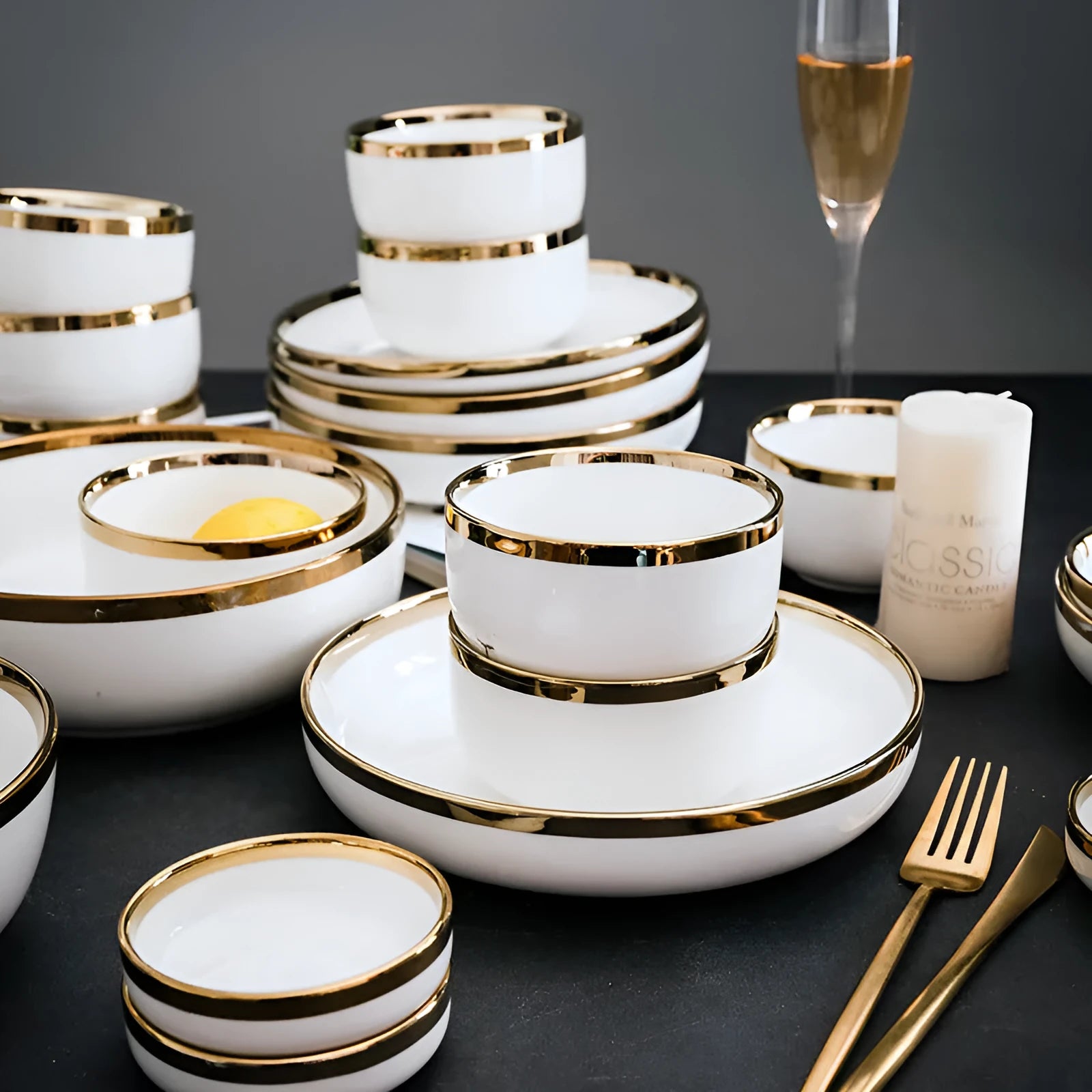 Platinum-coloured porcelain bowl and plate with gold rim, part of a wedding gift tableware set.