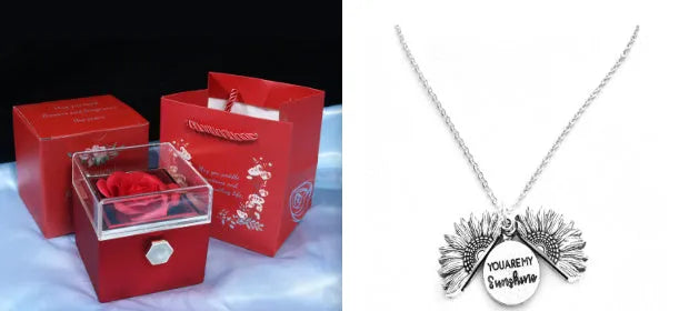 Rotating rose jewellery gift box with a preserved red rose under a clear acrylic dome, showing the interior rotating drawer.