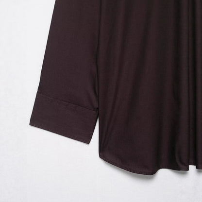 Brown women's loose-fit poplin shirt with long sleeves and an attached bow tie scarf.