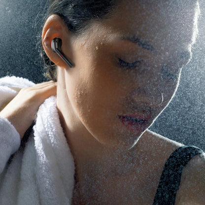 VV1 black and white Bluetooth wireless earphones with charging case showing in-ear design