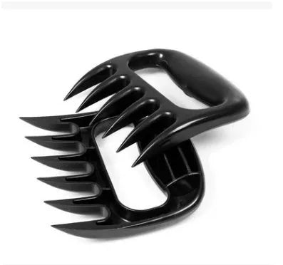Two black bear claw meat shredding forks with non-slip grips for barbecue preparation