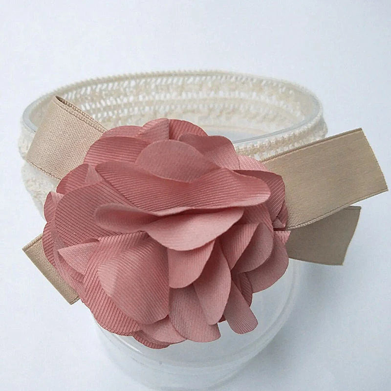 Baby lace headband with floral design in pink, grey, and rose red