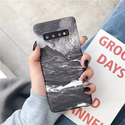 Samsung phone case with white and grey marble pattern on a polycarbonate back cover.