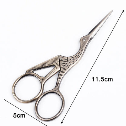 Elegant crane-shaped embroidery scissors crafted from premium stainless steel for precise, effortless cutting