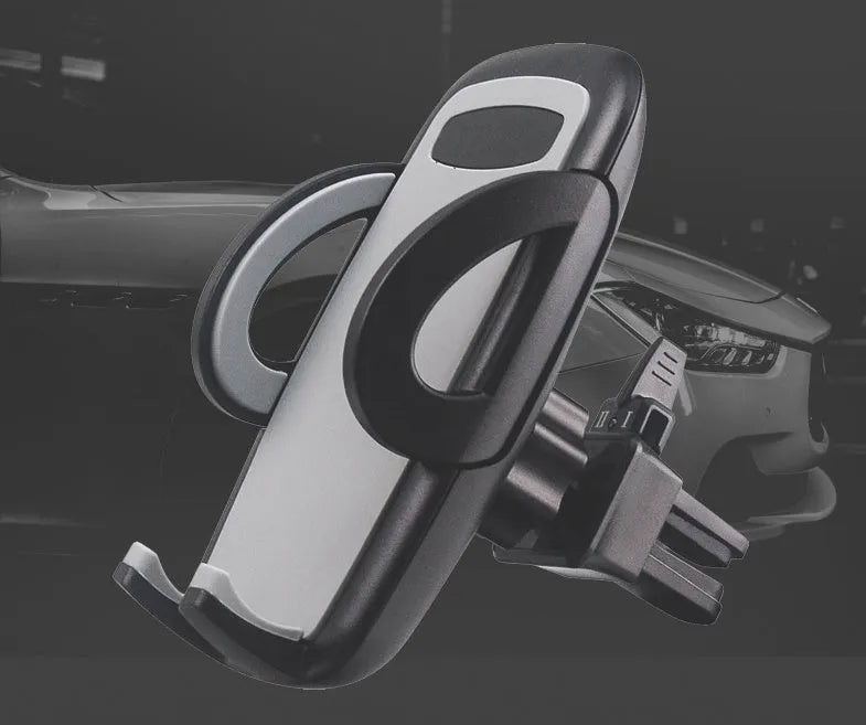 Black universal car air vent mobile phone holder attached to a vehicle vent, showing adjustable arms and 360-degree rotation.