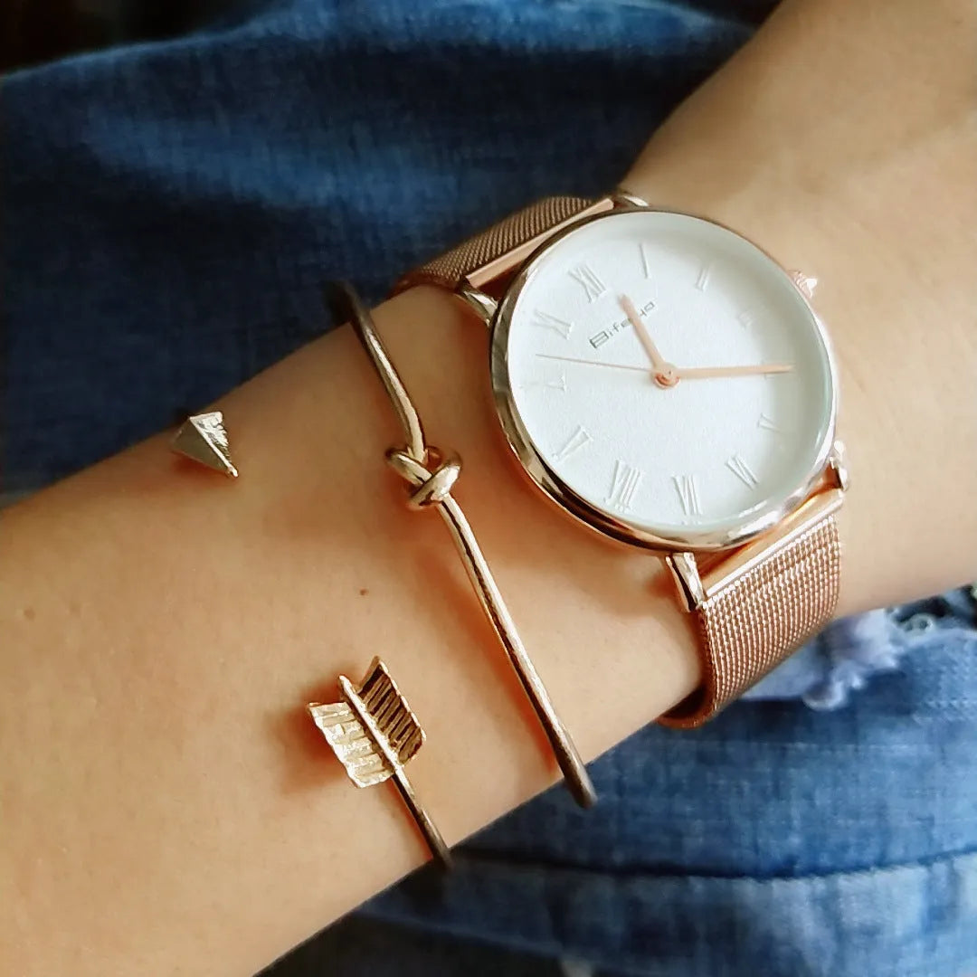 Gold-coloured vintage arrow knotted cuff bracelet for women.