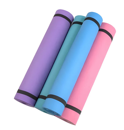 EVA composite fitness and yoga mat in blue, showing its texture and rolled edge next to a storage bag.