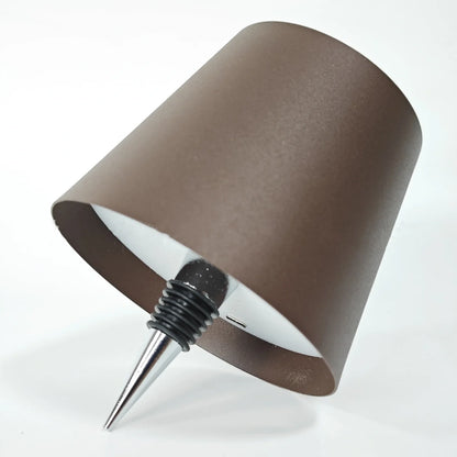 Wireless LED desk lamp in black tricolour finish, bottle-shaped with detachable base and touch control for 2000mAh powered lighting