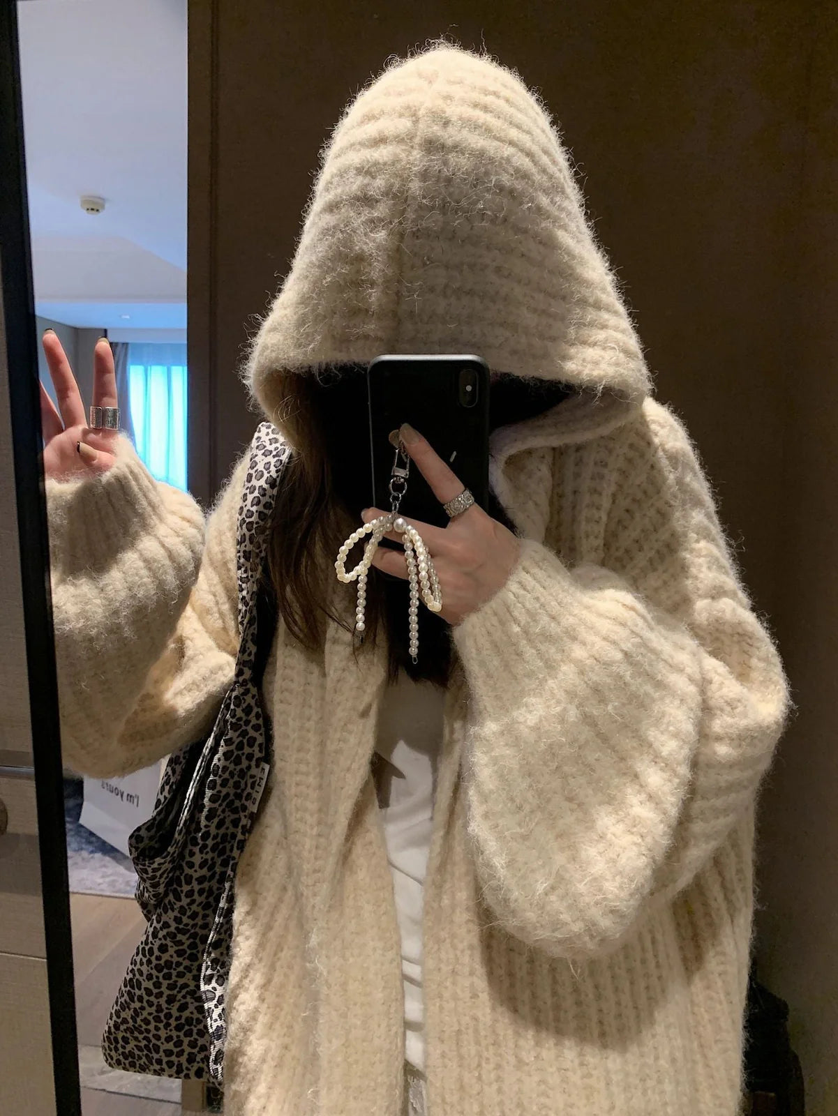 Women's grey hooded cardigan with thick acrylic fabric and regular sleeves