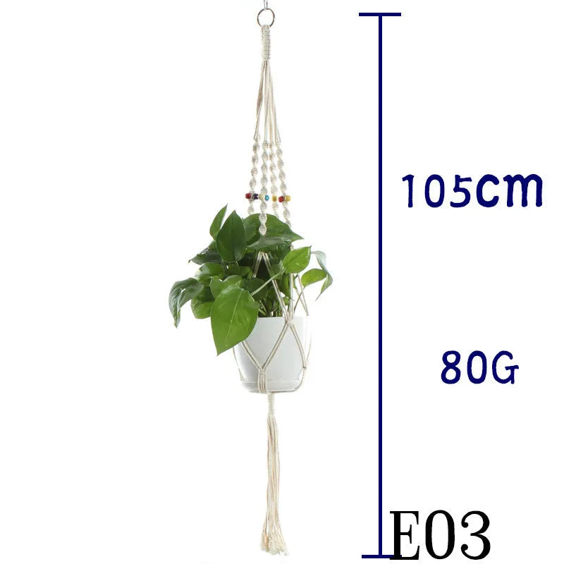Handmade beige cotton rope net bag holding a plant pot, showing its textured sling design.