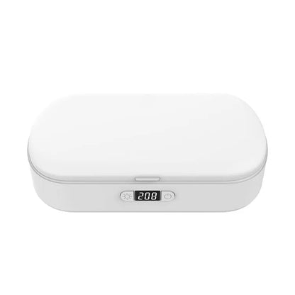 White wireless UV steriliser and charging box for mobile phones and small personal items.