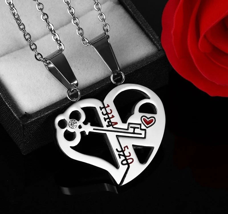 Captivating couples' love necklace set in gold, black, and silver colours with delicate chain and symbolic pendant design