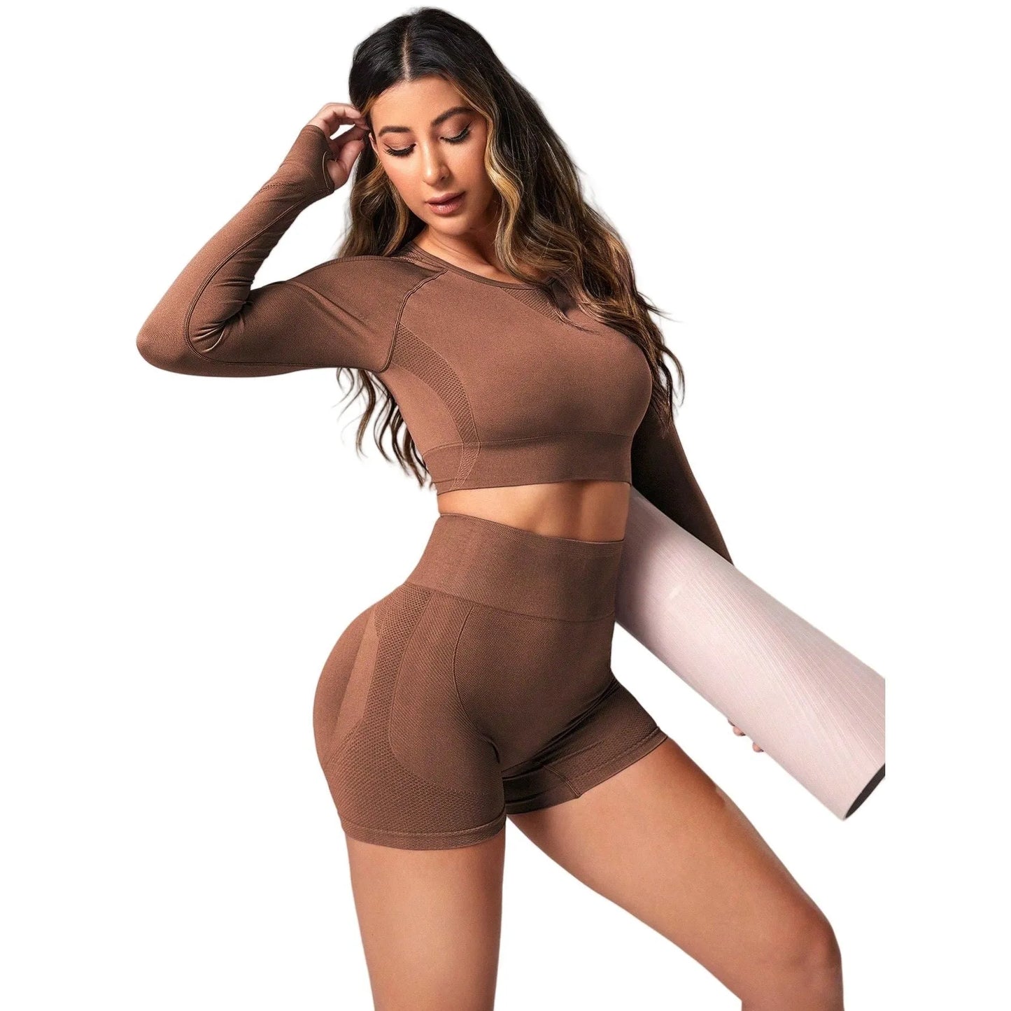 Women's high waist yoga suit in black colour showing long sleeve top and matching leggings