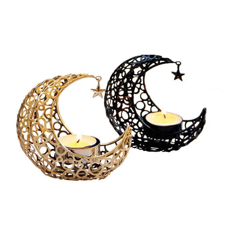 Metal crescent moon candle holder for tealight candles in black or gold colour on desktop
