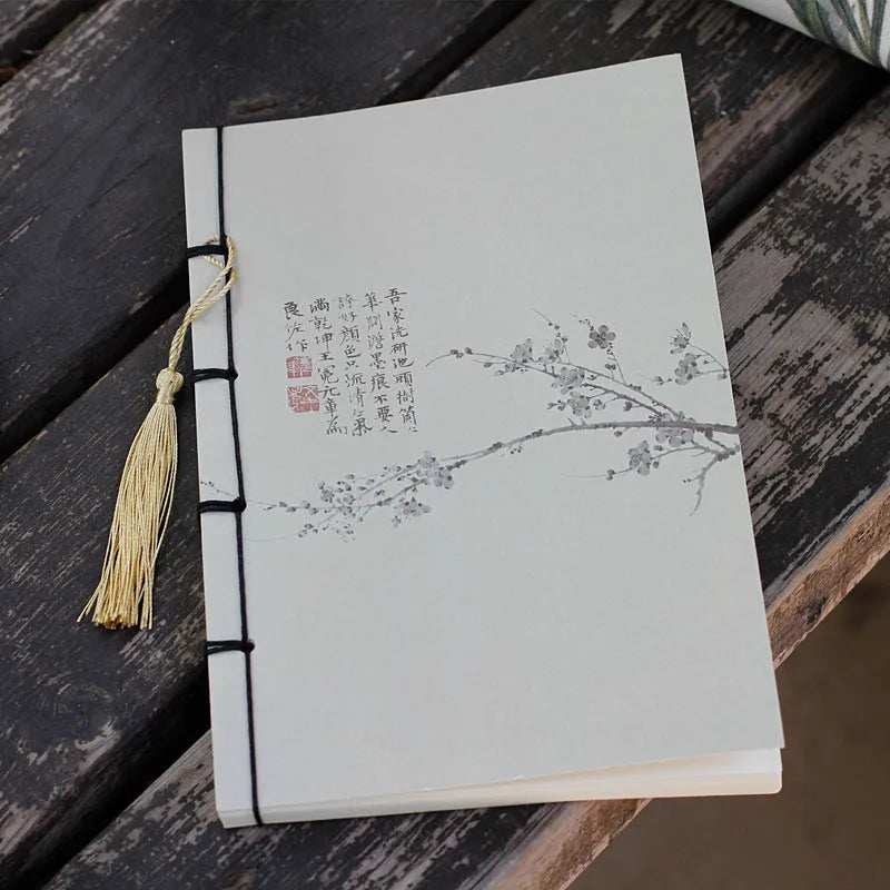A5 antique wire-bound notebook with classical artwork cover, black oil wax rope binding, and decorative tassels