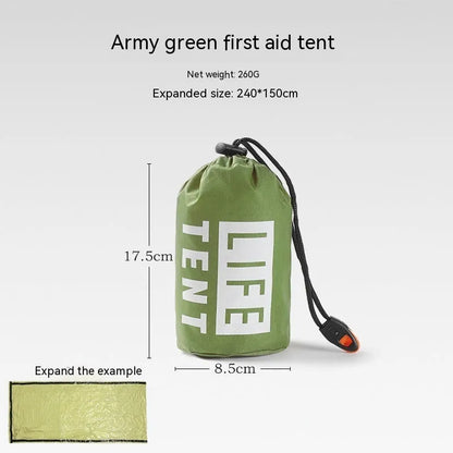Orange emergency tent with sleeping bag and blanket disaster relief kit on ground