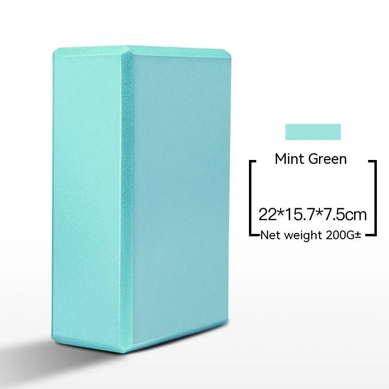 High-density EVA foam yoga block in violet colour, shown next to a pink block with a cartoon bunny print.