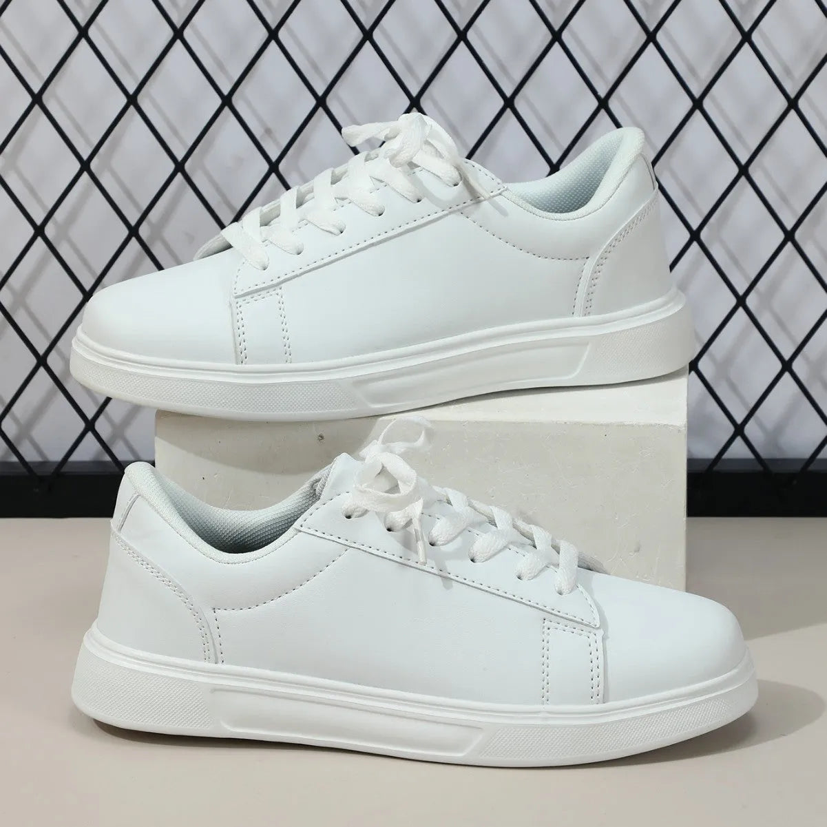 Casual beige brown platform skateboard sneakers with a low-top PU upper, round toe, and cross-strap detail