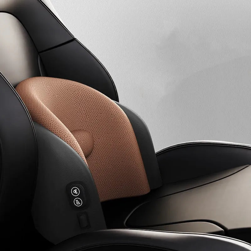 Black car massage cushion with headrest and lumbar support on a car seat, showing wired controller.