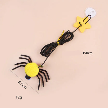 Red hanging door cat toy with elastic rope, feathers and spider-shaped bell mounted on door frame