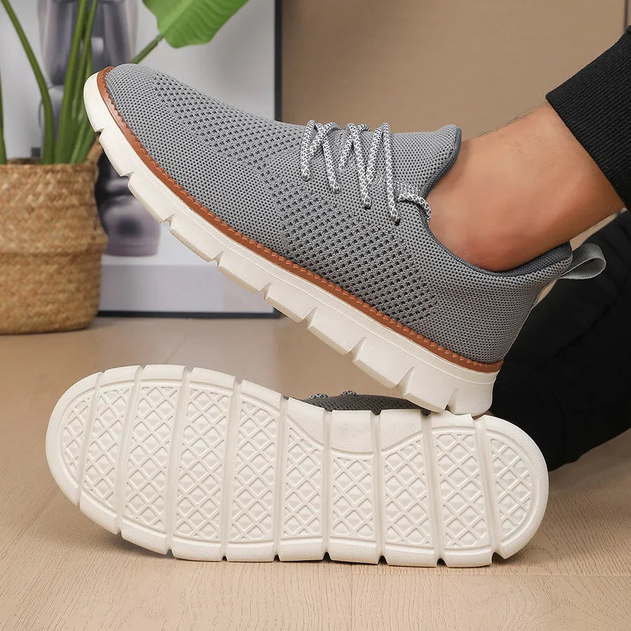 Men's grey and black low-heel casual sneaker with mesh fabric upper and round toe