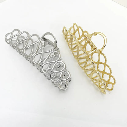 Large minimalist alloy hair clip with electroplated gold finish and irregular tassel decoration for creating updo hairstyles