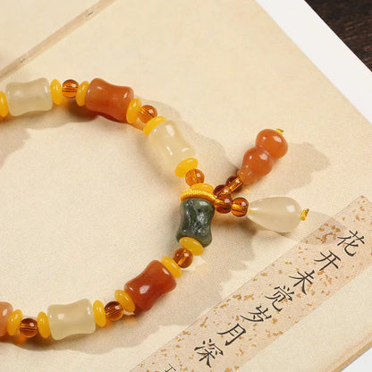 Natural Xinjiang Jinsi Jade small bone beads bracelet with geometric beads and auspicious patterns