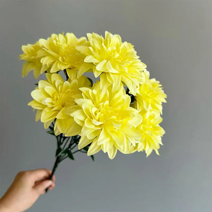 Desktop fan-shaped display holding artificial silk flowers in rose and peony varieties with colourful petals